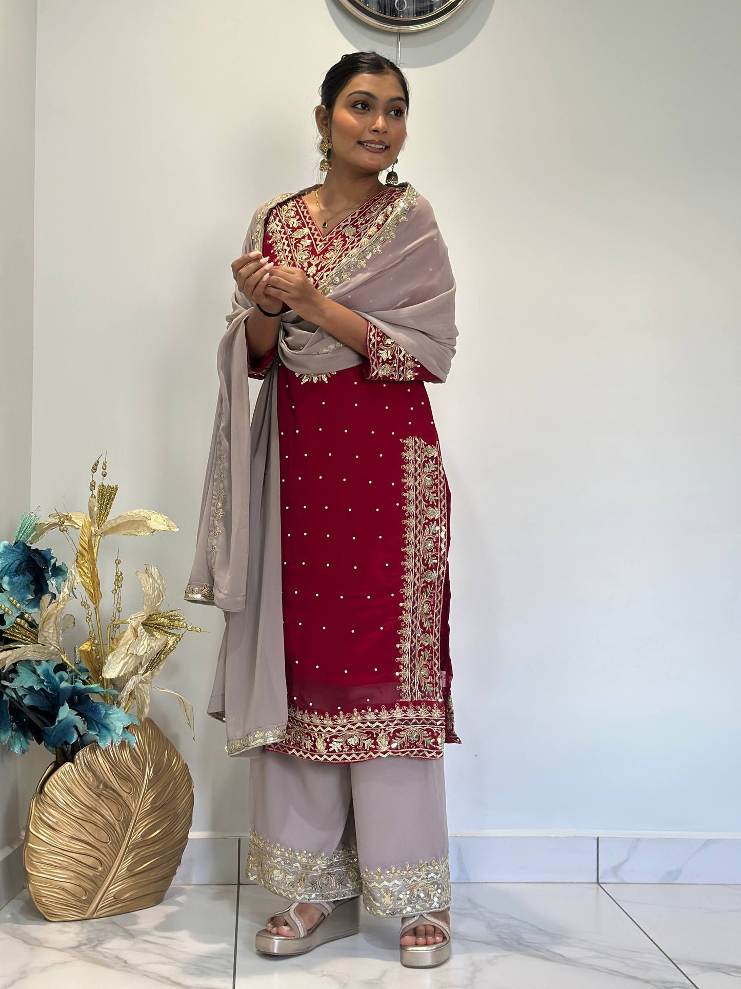 Opulent Faux Georgette Top-Plazzo Set Accented with Moti and Sequin Handwork