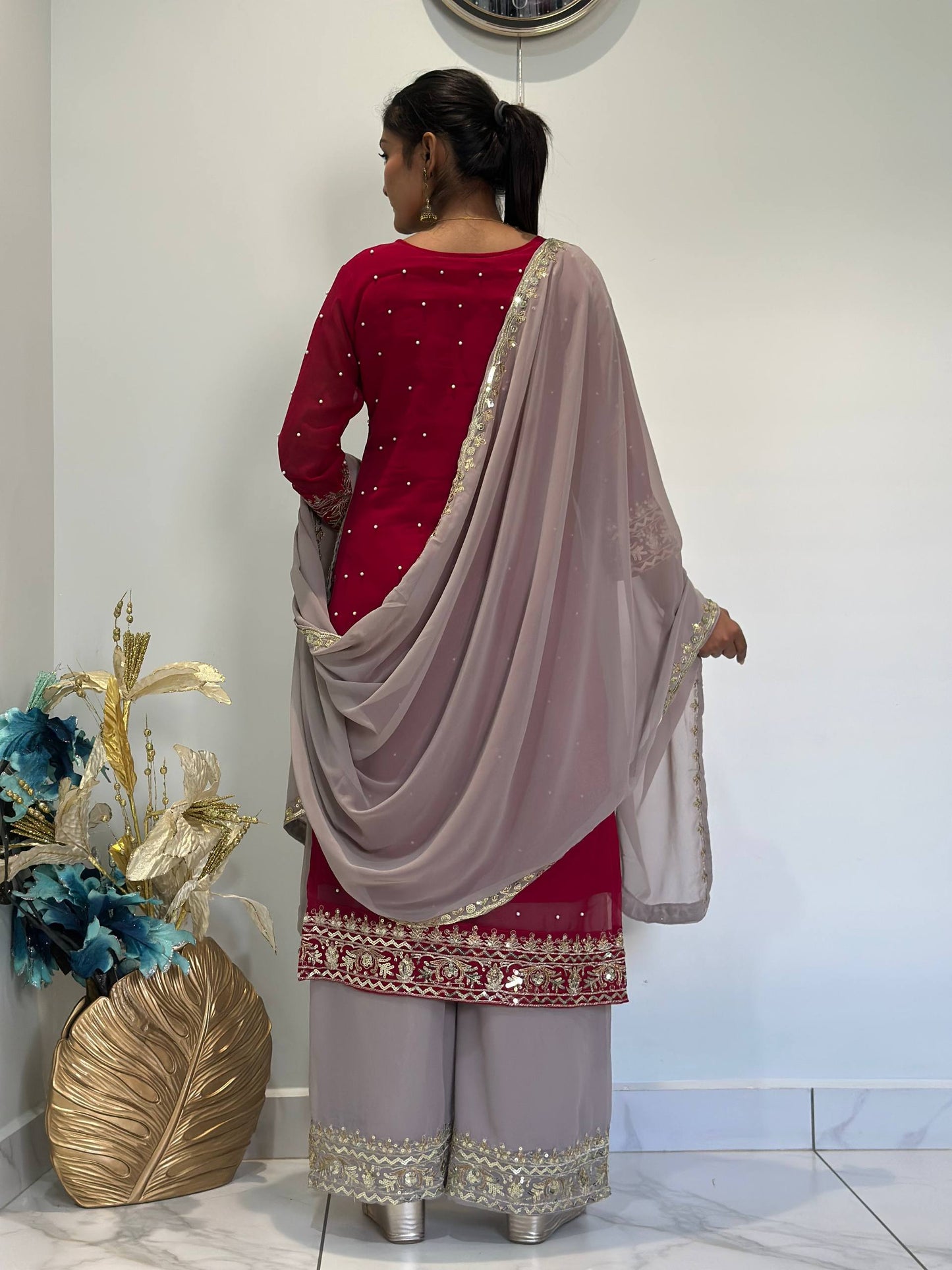 Opulent Faux Georgette Top-Plazzo Set Accented with Moti and Sequin Handwork
