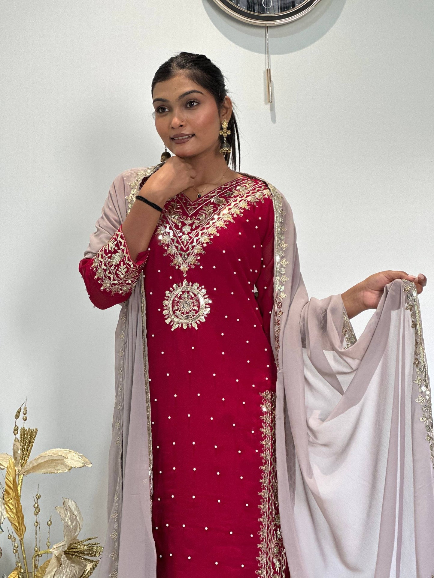 Opulent Faux Georgette Top-Plazzo Set Accented with Moti and Sequin Handwork