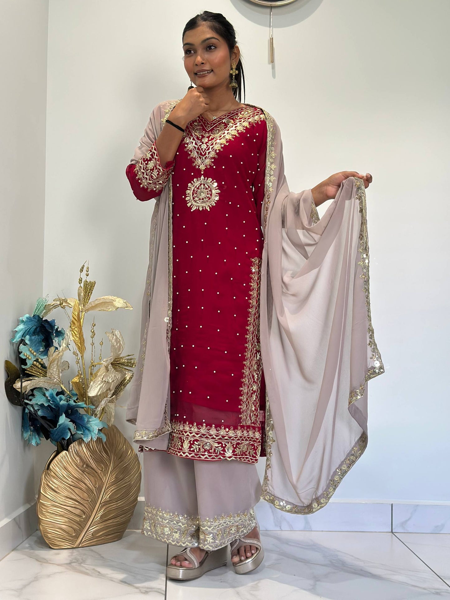 Opulent Faux Georgette Top-Plazzo Set Accented with Moti and Sequin Handwork