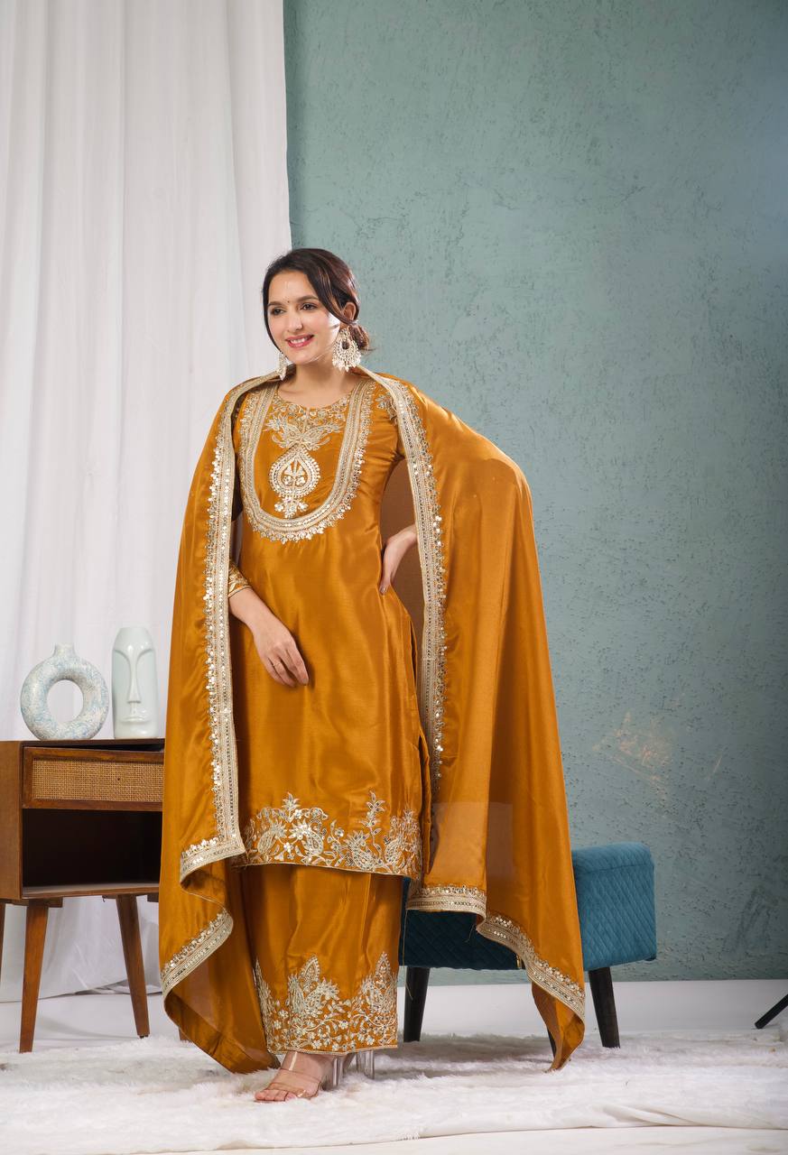 Graceful Pure Chinnon Silk Ensemble Showcasing Heavy All-Over Coding Sequin Embroidery Work
