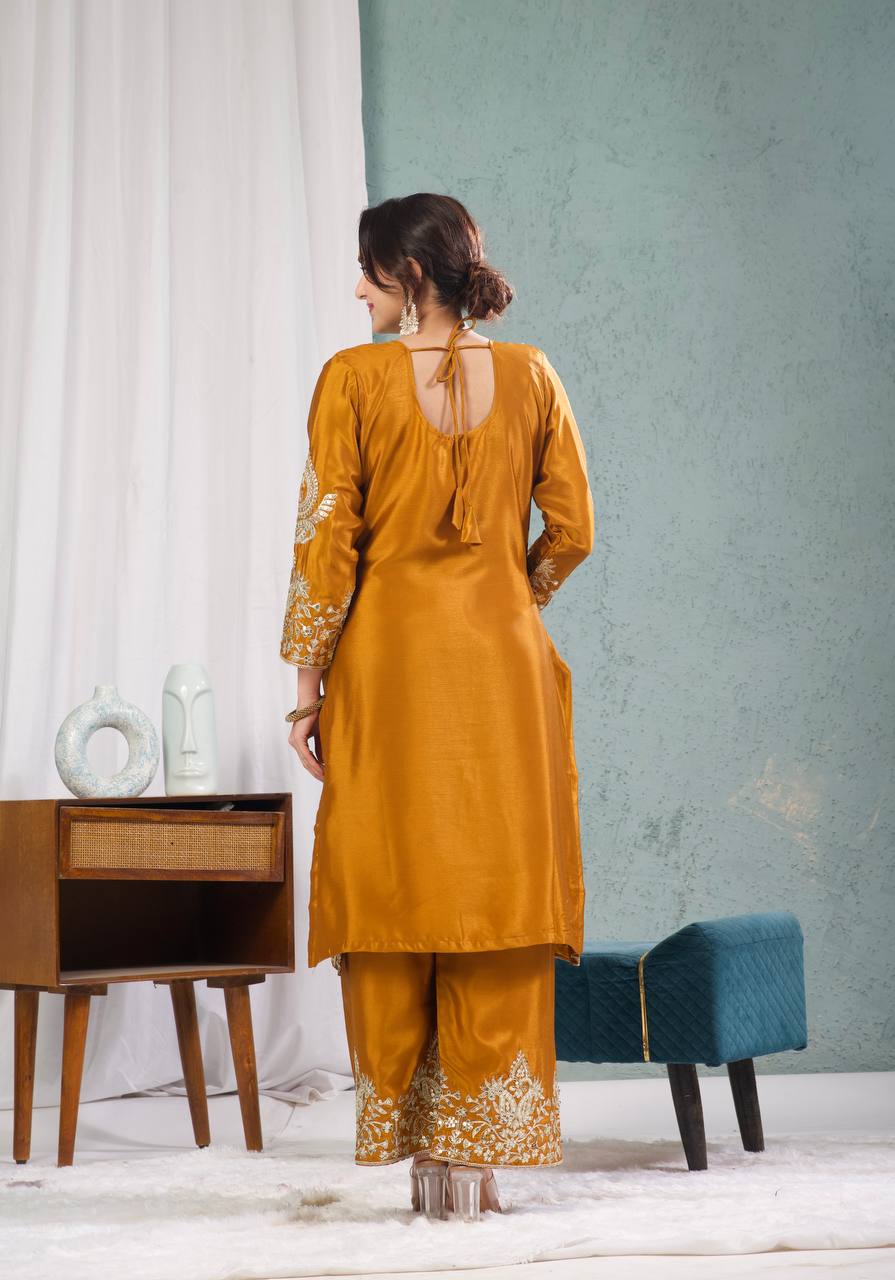 Graceful Pure Chinnon Silk Ensemble Showcasing Heavy All-Over Coding Sequin Embroidery Work