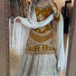 Gold-Toned Designer Lehenga Choli Set in Chinon Silk with Zari & Sequin Embroidery